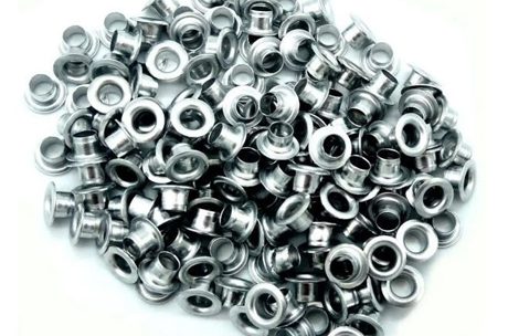 Versatilidade do ilhós de metal: da moda ao setor de embalagens